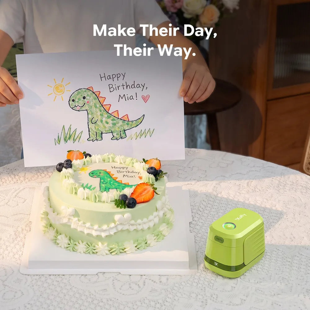 EdiBot product cover with a dinosaur birthday drawing, a matching cake and a green EdiBot printer.
